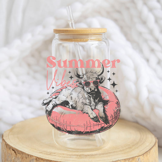 Summer Vibes Cow Pool Float design on a 16 oz glass tumbler