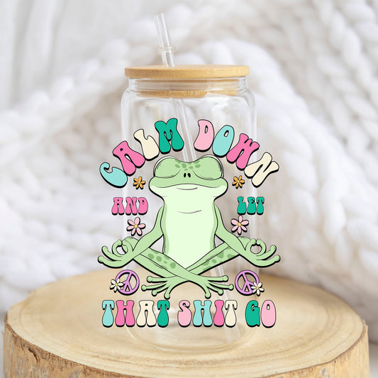 Calm Down and Let That Sh*t Go design on a 16 oz glass tumbler