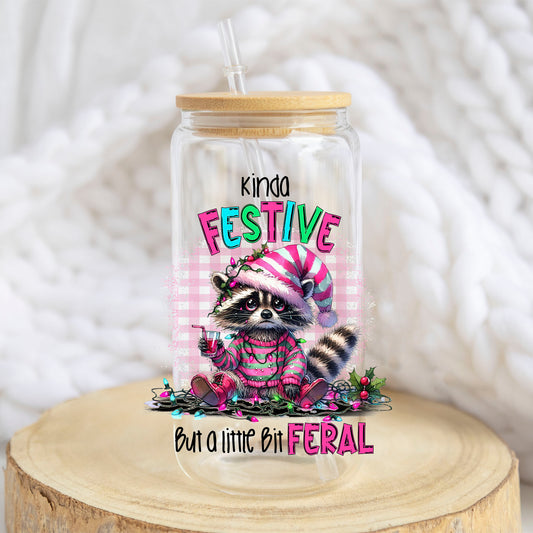 Kinda Festive But a Little Bit Feral design on a 16 oz glass tumbler