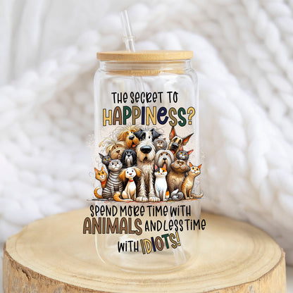 The Secret to Happiness Animals design on a 16 oz glass tumbler