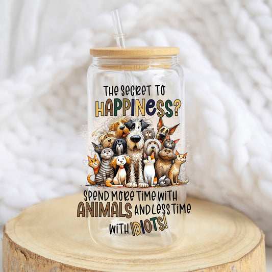 The Secret to Happiness Animals design on a 16 oz glass tumbler