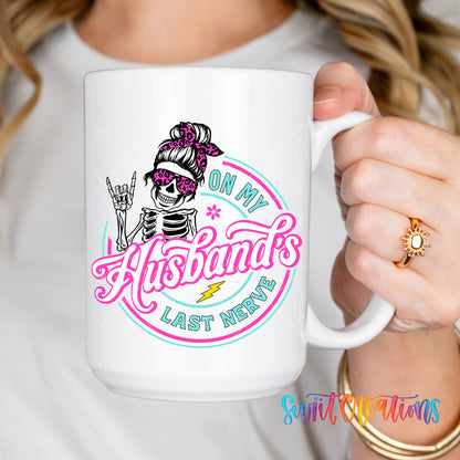 Woman holding the On My Husband's Last Nerve skeleton 15oz ceramic coffee mug