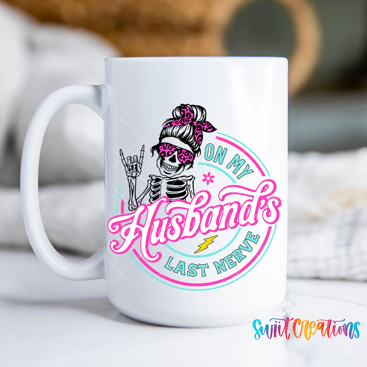 On My Husband's Last Nerve skeleton mug with pink and teal lettering, 15oz white ceramic