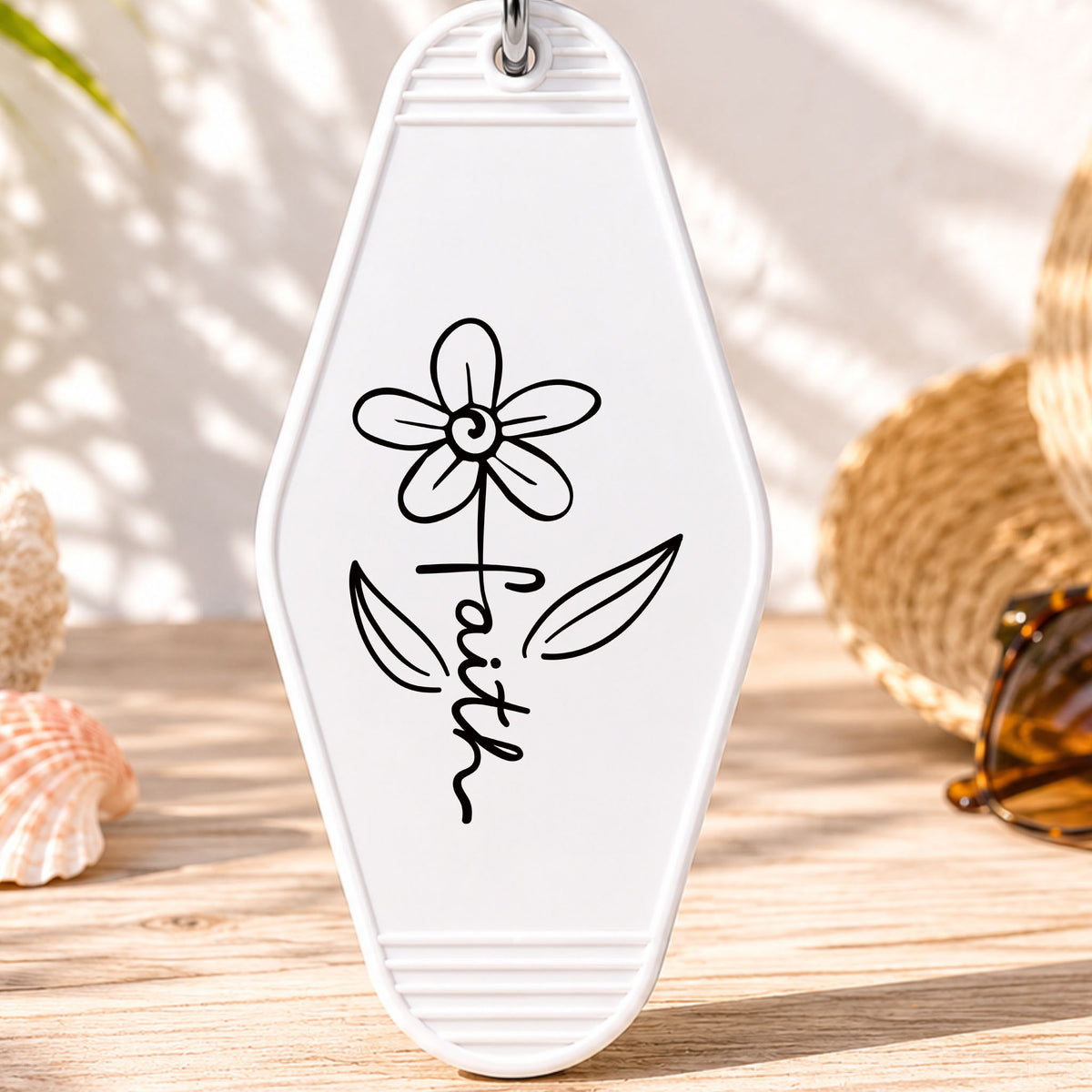 Faith Flower UV DTF transfer on a white motel keychain with beach decor