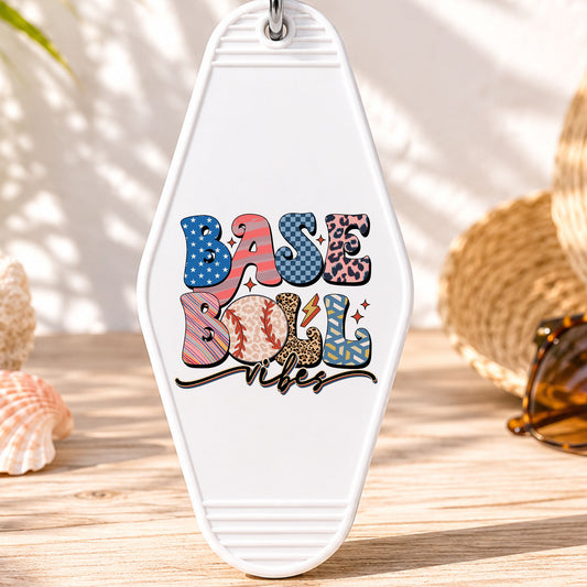 Baseball Vibes UV DTF transfer on a white motel keychain with beach decor