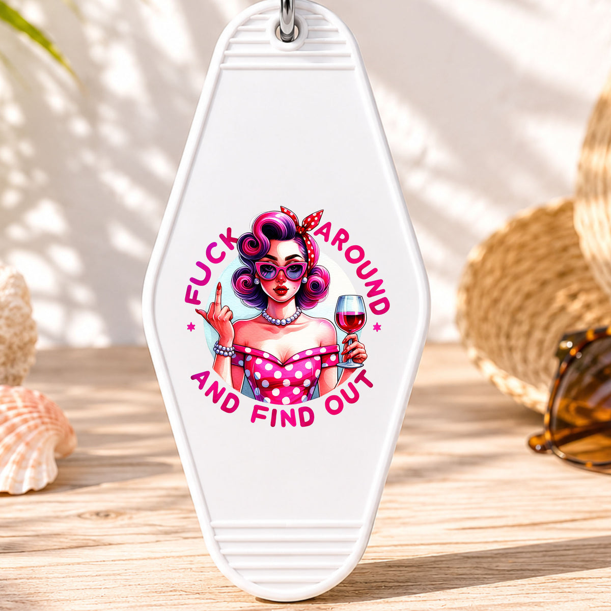 F*ck Around and Find Out UV DTF transfer on a white motel keychain with beach decor