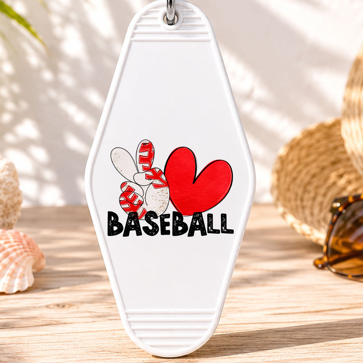 Peace Love Baseball UV DTF transfer on a white motel keychain with beach decor