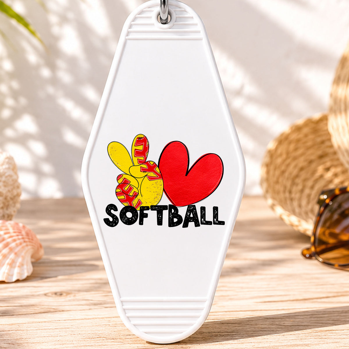 Peace Love Softball UV DTF transfer on a white motel keychain with beach decor