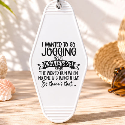 I Wanted to Go Jogging UV DTF transfer on a white motel keychain with beach decor
