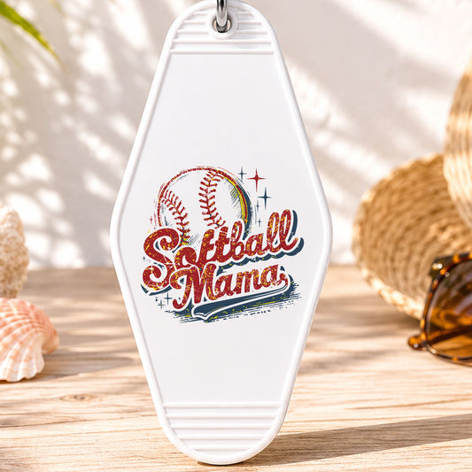Softball Mama UV DTF transfer on a white motel keychain with beach decor