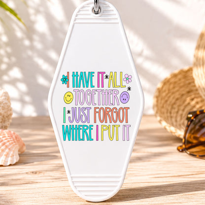 I Have It All Together I Just Forgot Where I Put It UV DTF transfer on a white motel keychain with beach decor