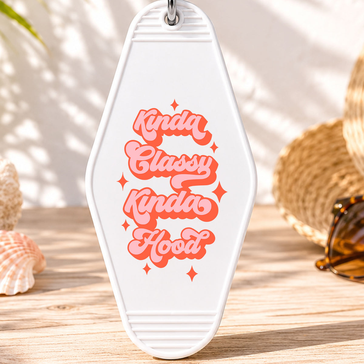 Kinda Classy Kinda Hood UV DTF transfer on a white motel keychain with beach decor