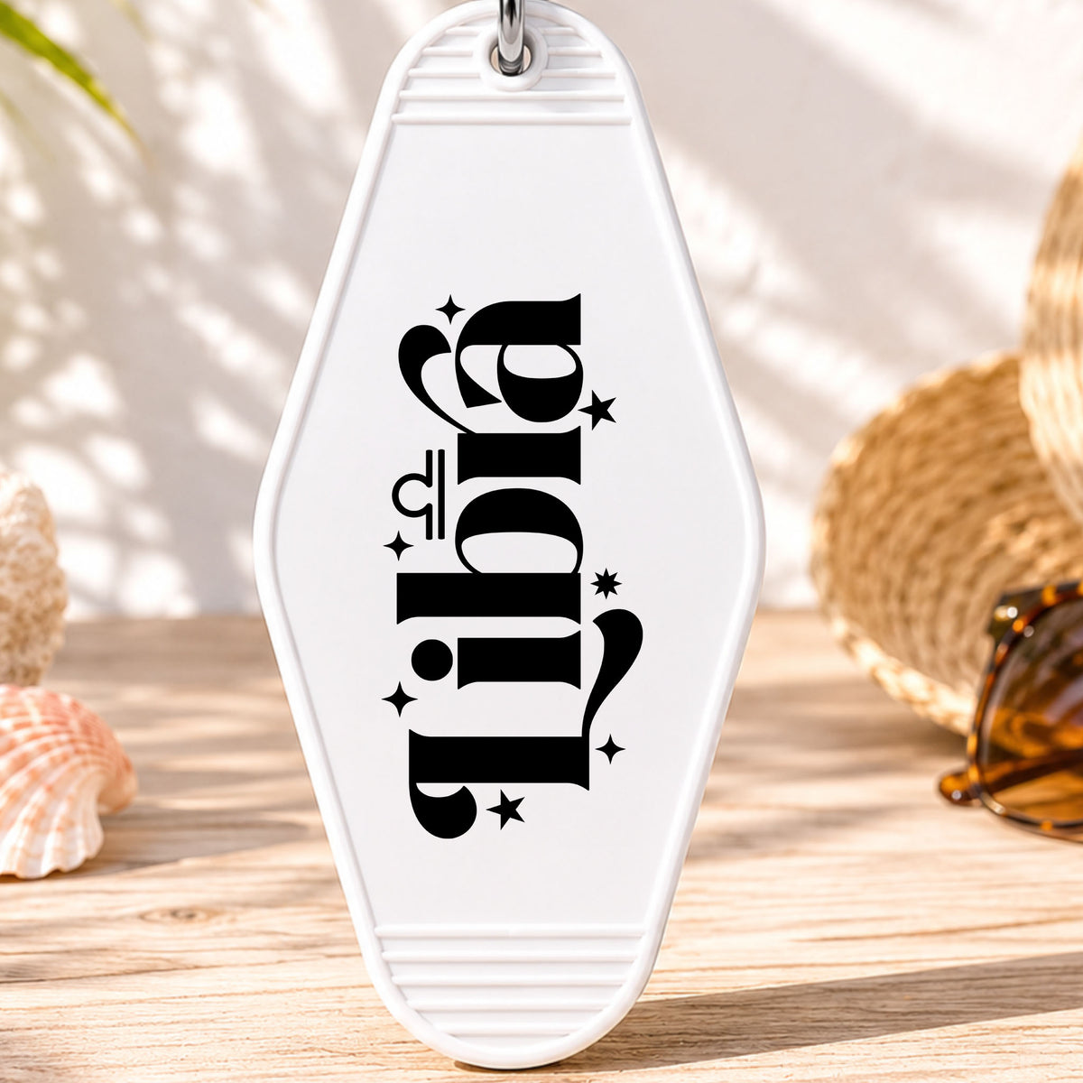 Libra UV DTF transfer on a white motel keychain with beach decor