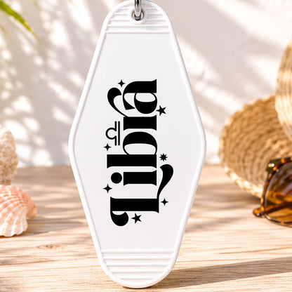 Libra UV DTF transfer on a white motel keychain with beach decor