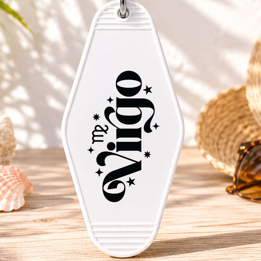 Virgo UV DTF transfer on a white motel keychain with beach decor