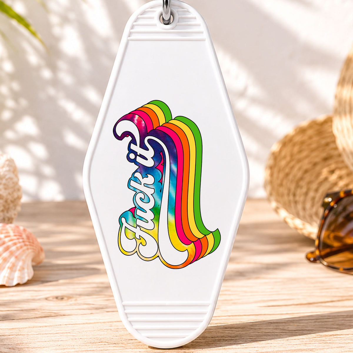 F*ck It UV DTF transfer on a white motel keychain with beach decor