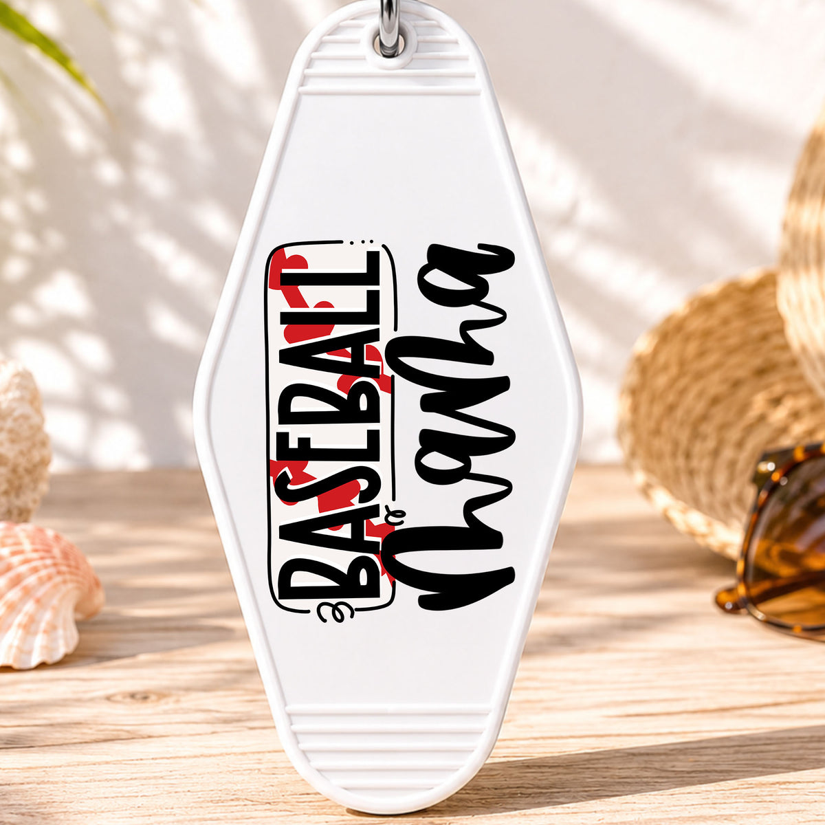 Baseball Mama UV DTF transfer on a white motel keychain with beach decor