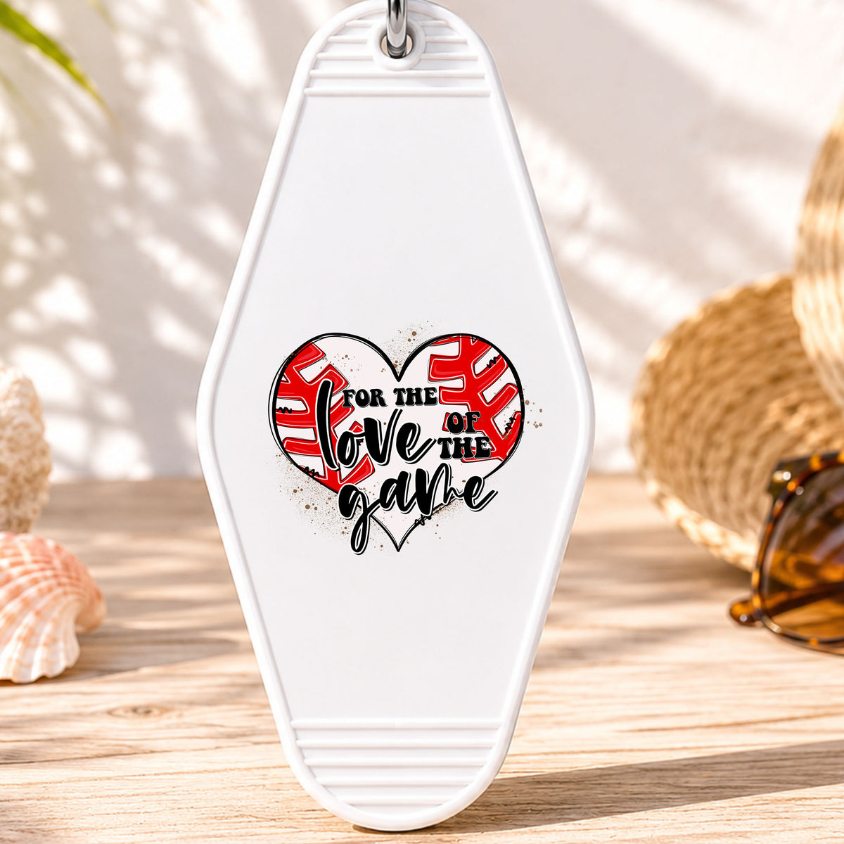 For the Love of the Game UV DTF transfer on a white motel keychain with beach decor