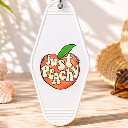 Just Peachy UV DTF transfer on a white motel keychain with beach decor