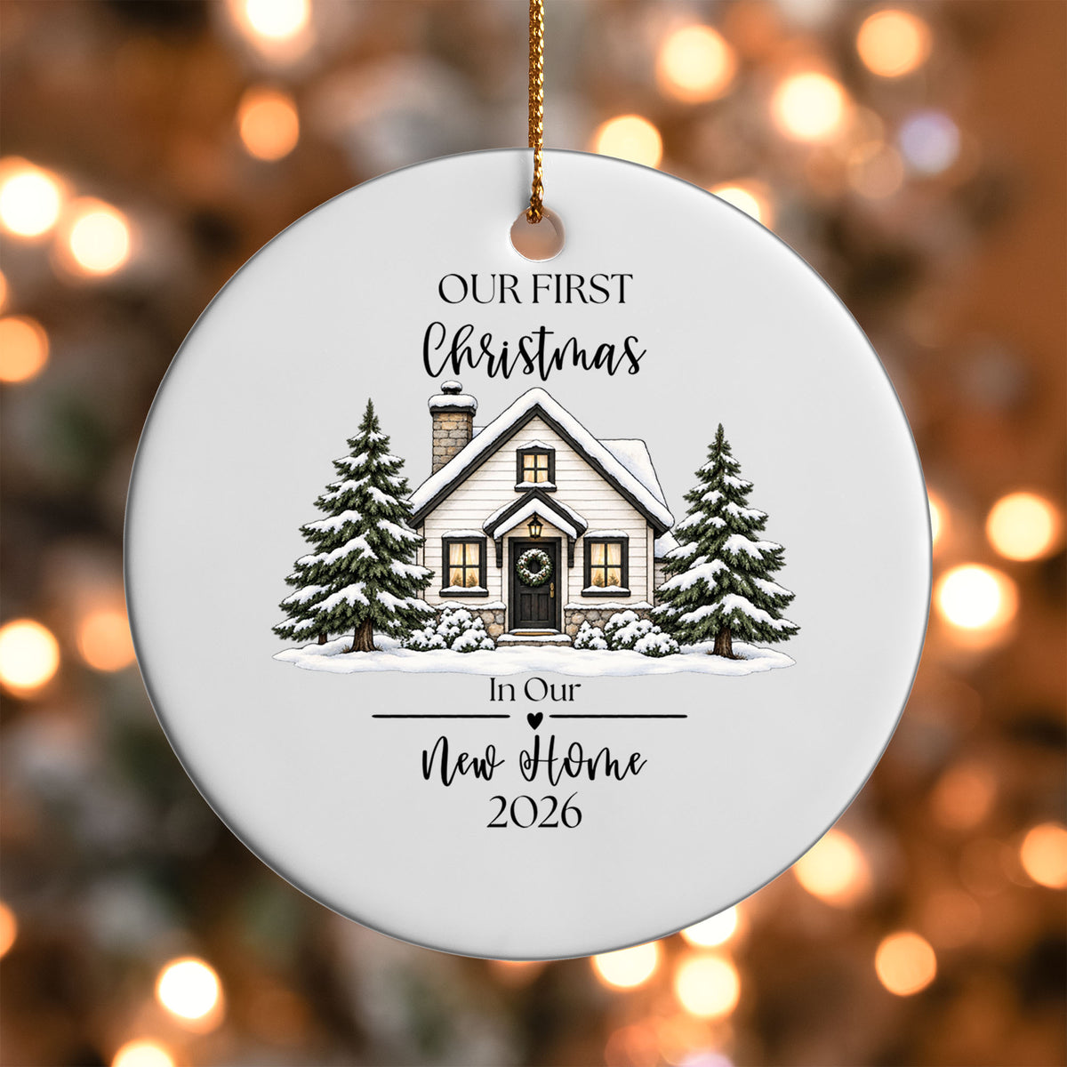 Our First Christmas New Home ornament UV DTF transfer on a round white ornament with a bokeh light background
