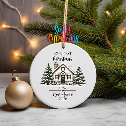 Our First Christmas New Home ornament UV DTF transfer on a hanging ornament with pine branches and a gold bauble