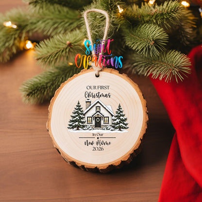 Our First Christmas New Home UV DTF transfer on a wood slice ornament with pine branches and a red stocking