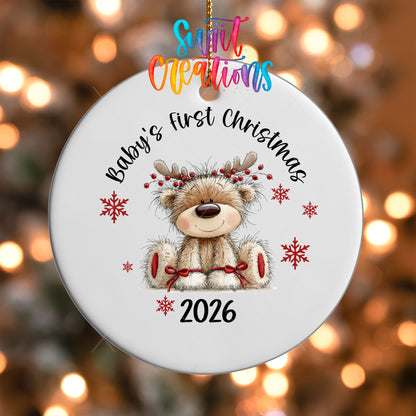 Close-up of the Baby's First Christmas UV DTF transfer on a round white ornament