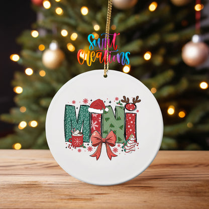 Mini ornament UV DTF transfer on an ornament on a wooden table with tree lights behind it