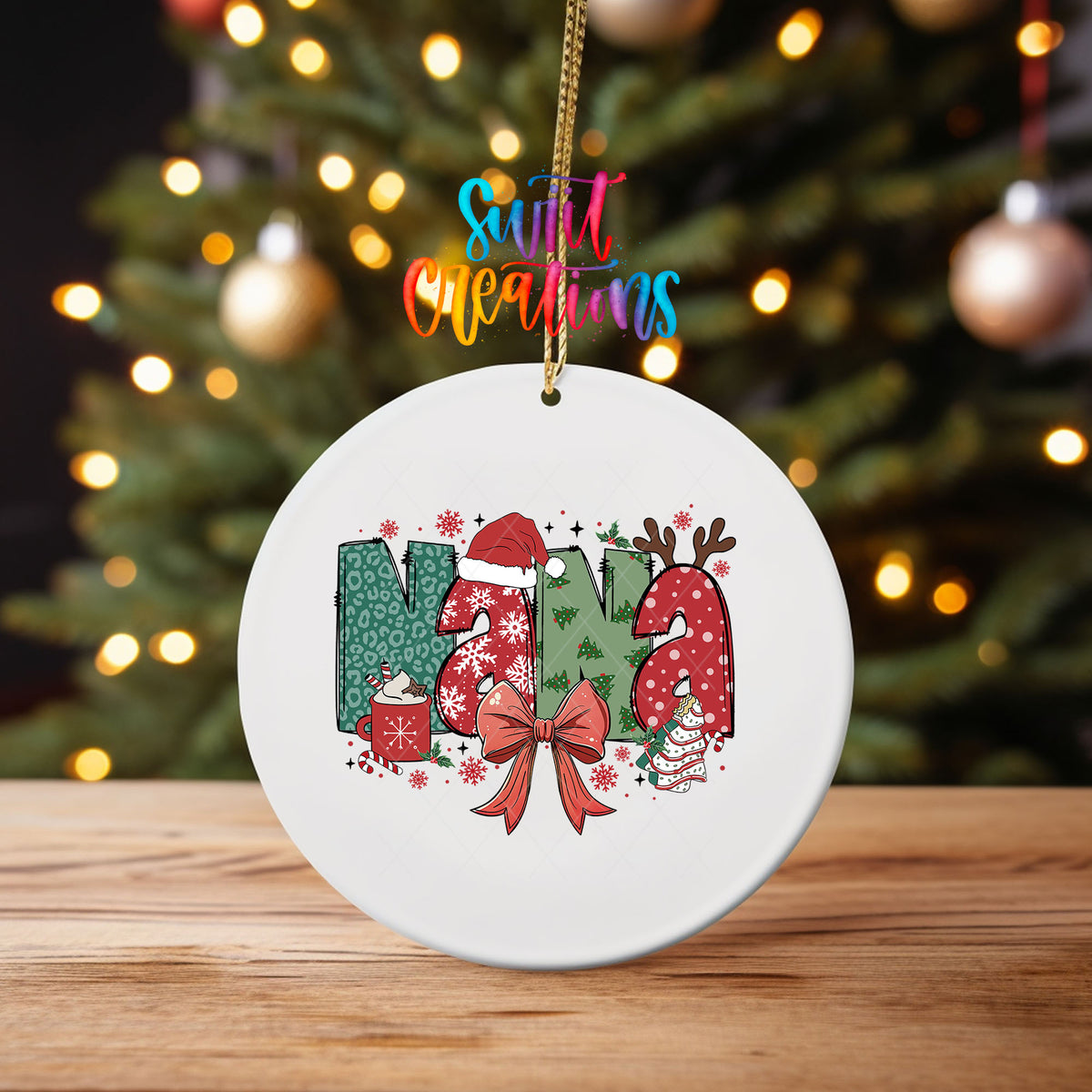Nana ornament UV DTF transfer on an ornament on a wooden table with tree lights behind it