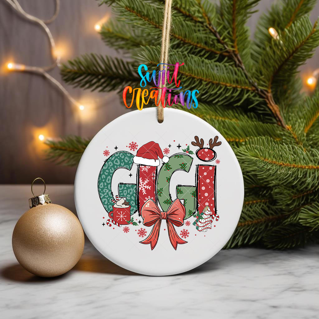 Gigi ornament UV DTF transfer on a hanging ornament with pine branches and a gold bauble