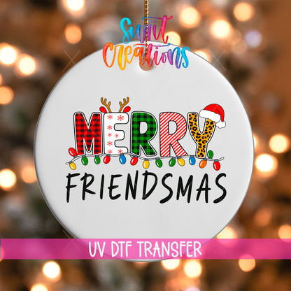 Merry Friendsmas UV DTF transfer on a white ornament with a pink UV DTF Transfer banner and bokeh lights