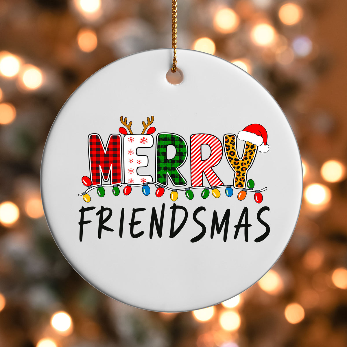 Merry Friendsmas ornament UV DTF transfer on a round white ornament with a bokeh light background