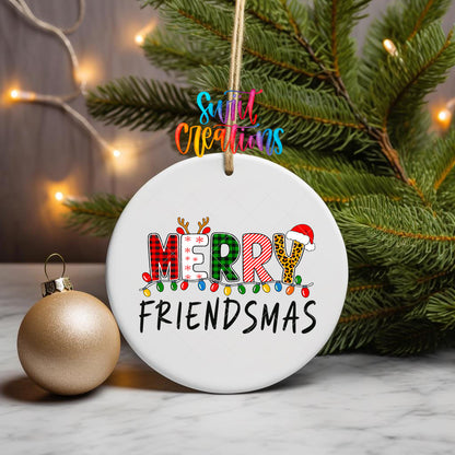 Merry Friendsmas ornament UV DTF transfer on a hanging ornament with pine branches and a gold bauble