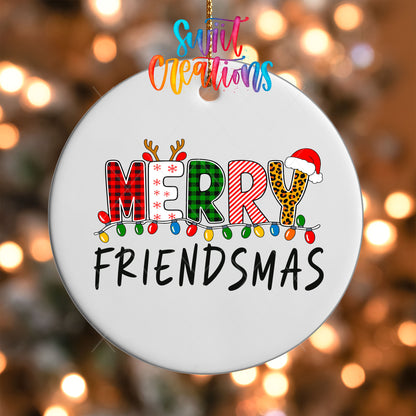 Close-up of the Merry Friendsmas UV DTF transfer on a round white ornament