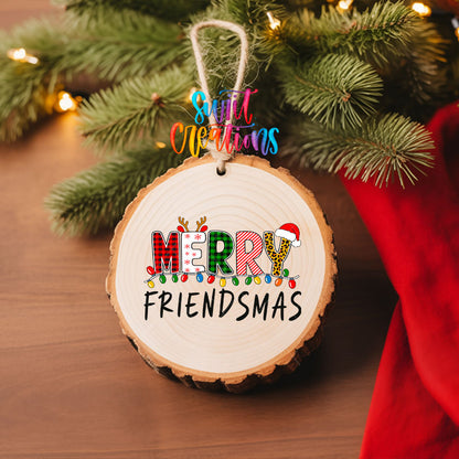 Merry Friendsmas UV DTF transfer on a wood slice ornament with pine branches and a red stocking