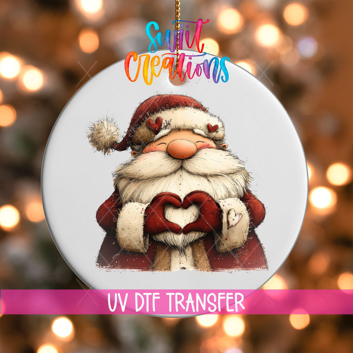 Cute Santa making heart hands UV DTF transfer on a white ornament with a pink UV DTF Transfer banner and bokeh lights