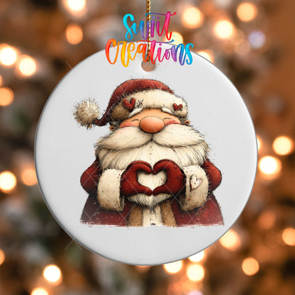 Close-up of the Cute Santa making heart hands UV DTF transfer on a round white ornament