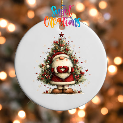 Close-up of the Cute Santa with heart hands in front of a Christmas tree UV DTF transfer on a round white ornament