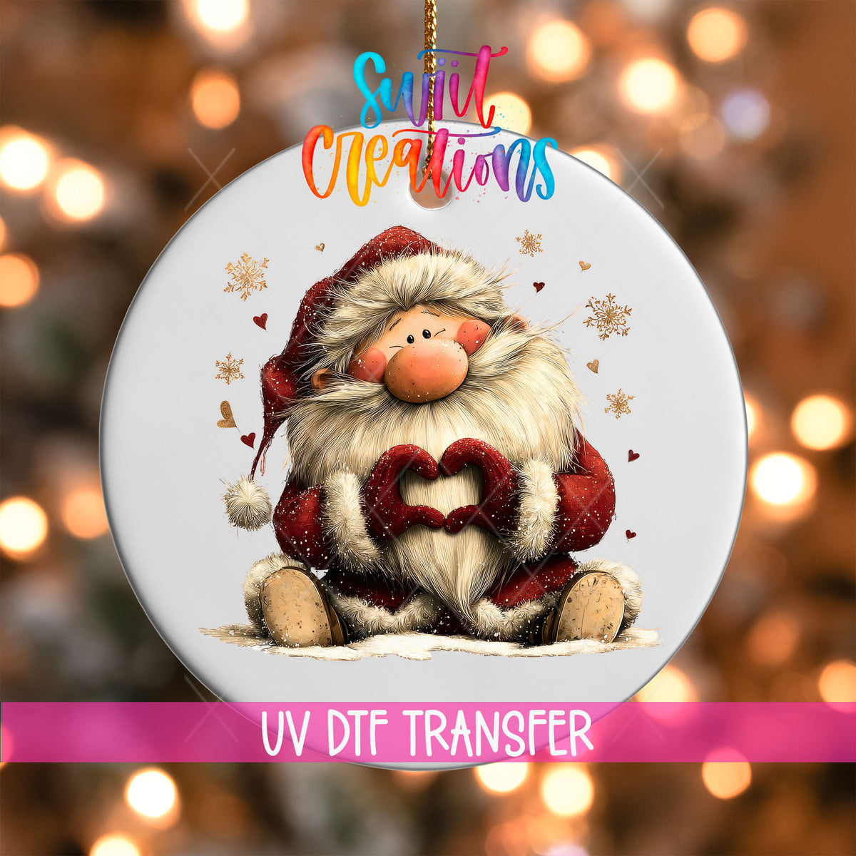 Cute sitting Santa making heart hands UV DTF transfer on a white ornament with a pink UV DTF Transfer banner and bokeh lights