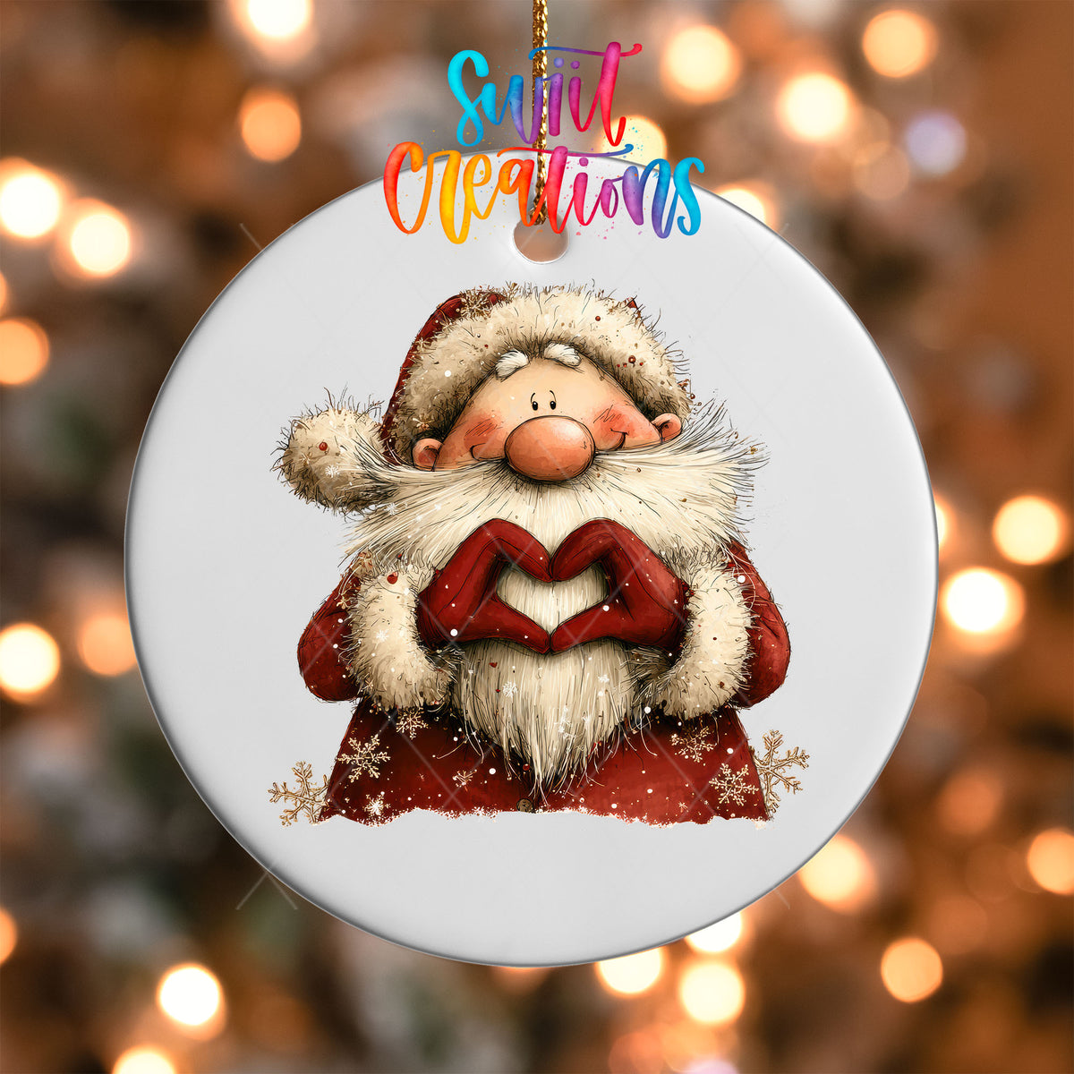 Close-up of the Cute Santa in a snowflake coat making heart hands UV DTF transfer on a round white ornament