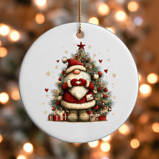 Cute Santa with a letter in front of a Christmas tree ornament UV DTF transfer on a round white ornament with a bokeh light background