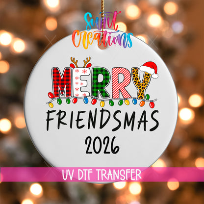 Merry Friendsmas 2026 UV DTF transfer on a white ornament with a pink UV DTF Transfer banner and bokeh lights