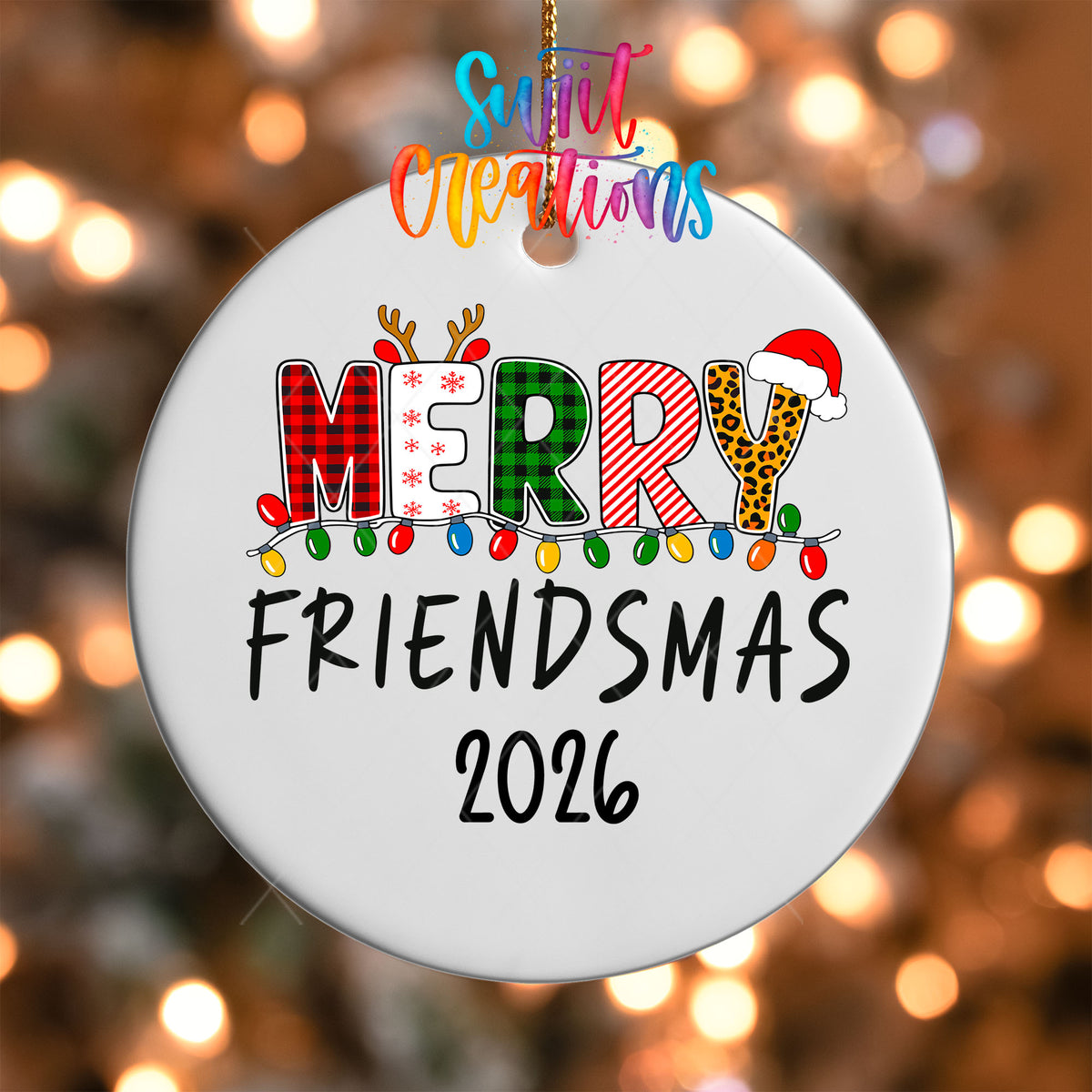 Close-up of the Merry Friendsmas 2026 UV DTF transfer with buffalo plaid, leopard print, reindeer antlers, and Christmas lights
