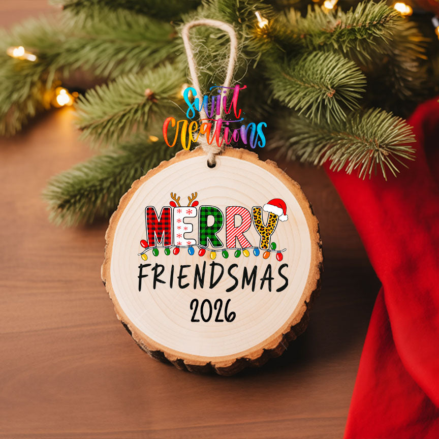 Merry Friendsmas 2026 UV DTF transfer on a wood slice ornament with pine branches and a red stocking