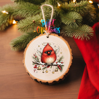Angel cardinal with halo and wings UV DTF transfer on a wood slice ornament with pine and a red stocking