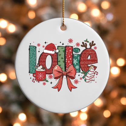 Lollie grandma name UV DTF transfer on a white ornament with bokeh lights
