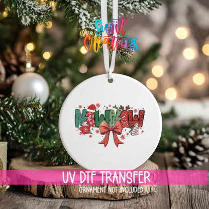 Mawmaw grandma name UV DTF transfer on a hanging ornament above a wood slice with pinecones and a UV DTF Transfer banner