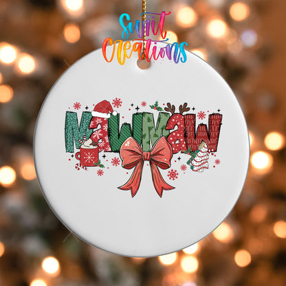 Close-up of the Mawmaw grandma name UV DTF transfer with a Santa hat, antlers, and red coquette bow on a white ornament