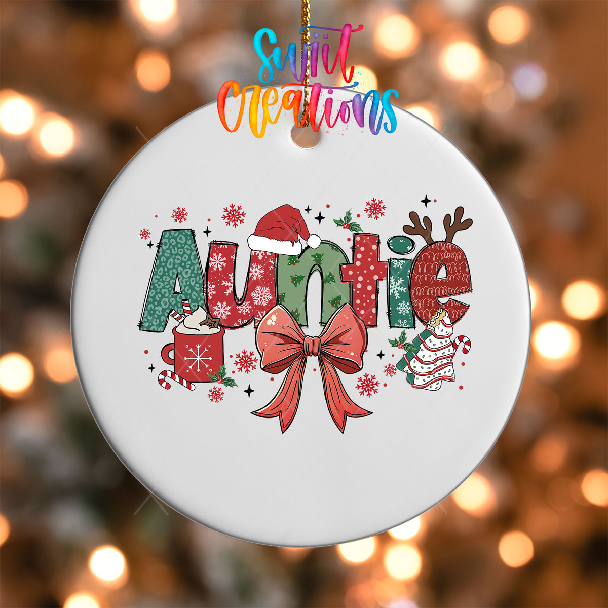 Close-up of the Auntie UV DTF transfer with a Santa hat, antlers, and red coquette bow on a white ornament