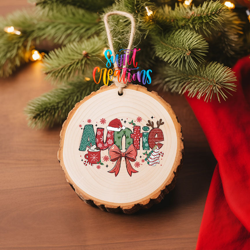 Auntie UV DTF transfer on a wood slice ornament with pine and a red stocking